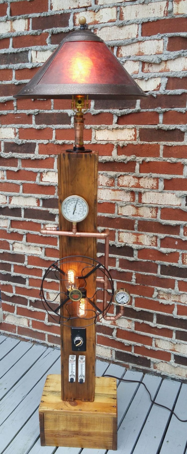 The body of this lamp uses a wooden box originally built to protect a, "War Trophy" shipped from Europe to Woodsfield, Oh at the end of WWII.