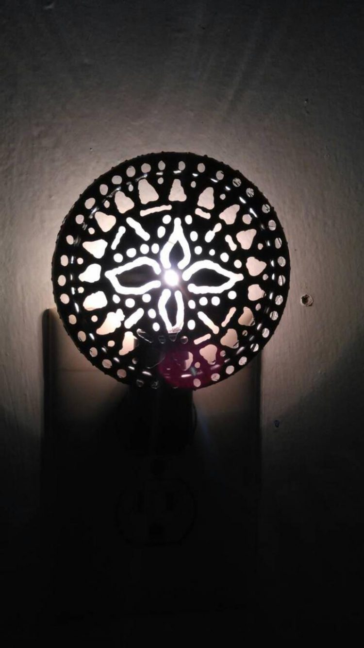 Mandala nightlights. Torch cut tin cans. Artistic welding.